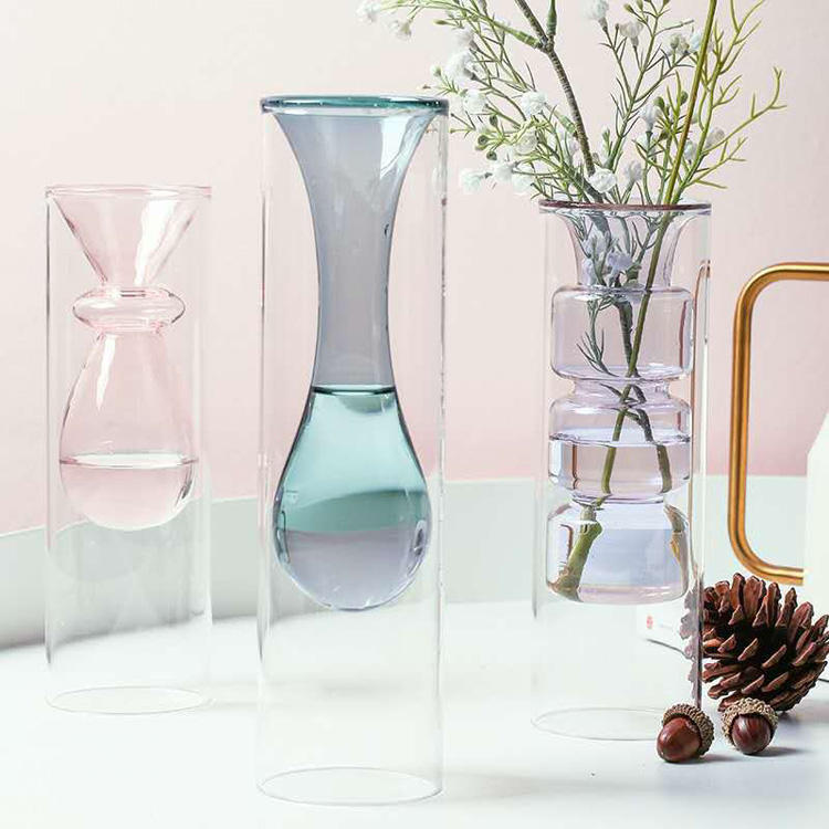 Pink green and purple glass bud vases