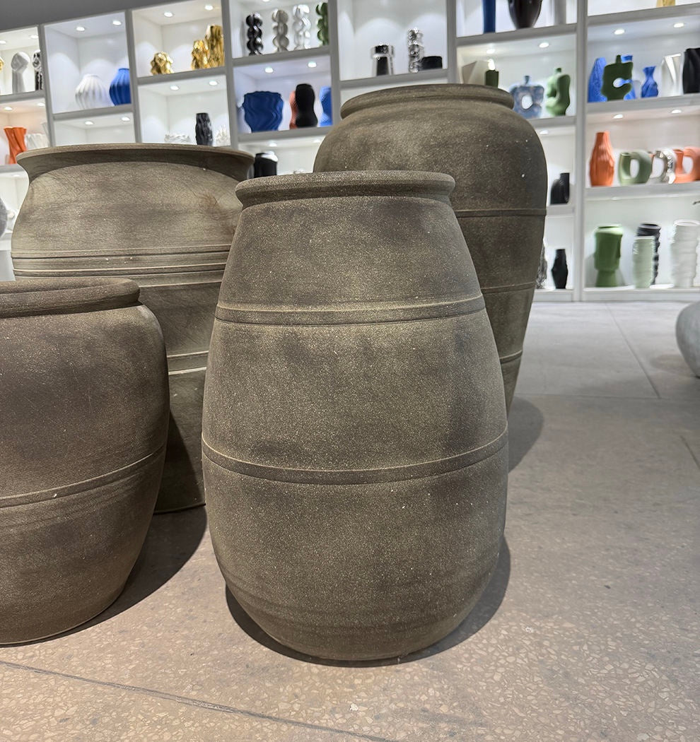 Textured grey floor vases in showroom