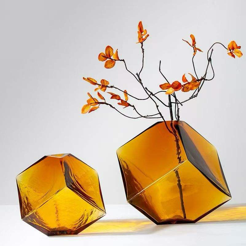 Amber geometric concave glass vases with decorative stems