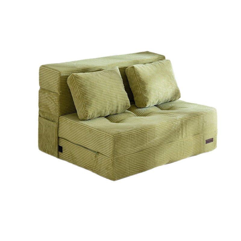 Green corduroy convertible sofa bed in sofa configuration