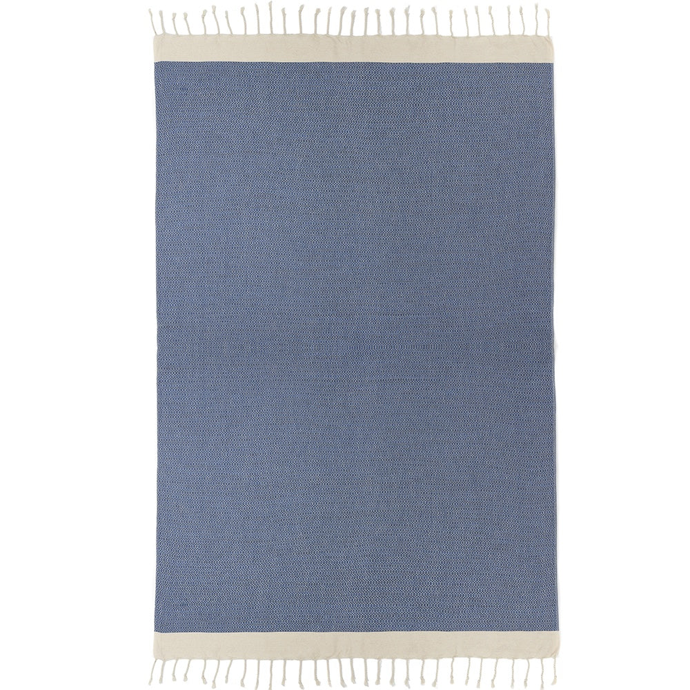 Blue cotton tassel throw blanket shown flat on a white background