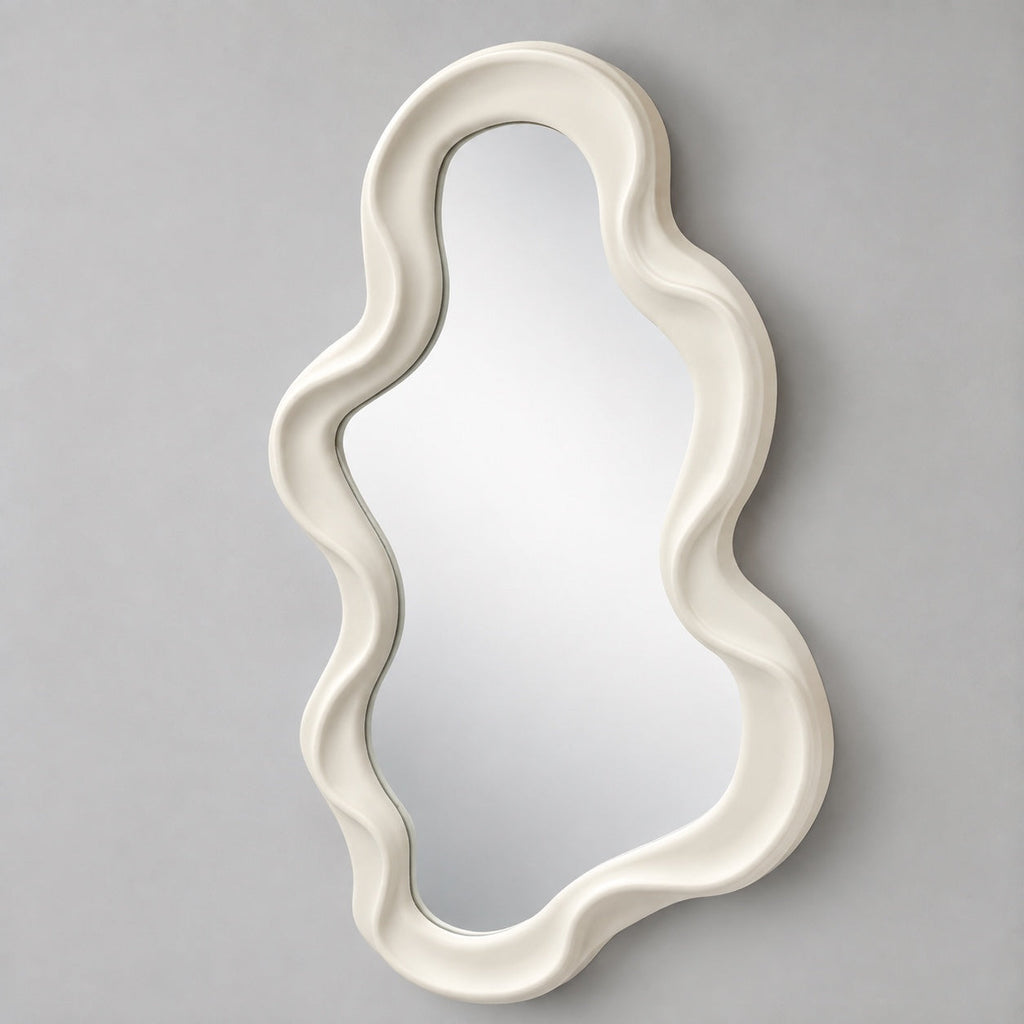 Irregular shaped ivory mirror with wide flowing frame